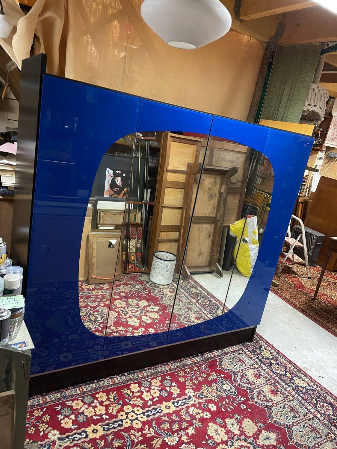 Vintage blue mirror wardrobe from the 70s.