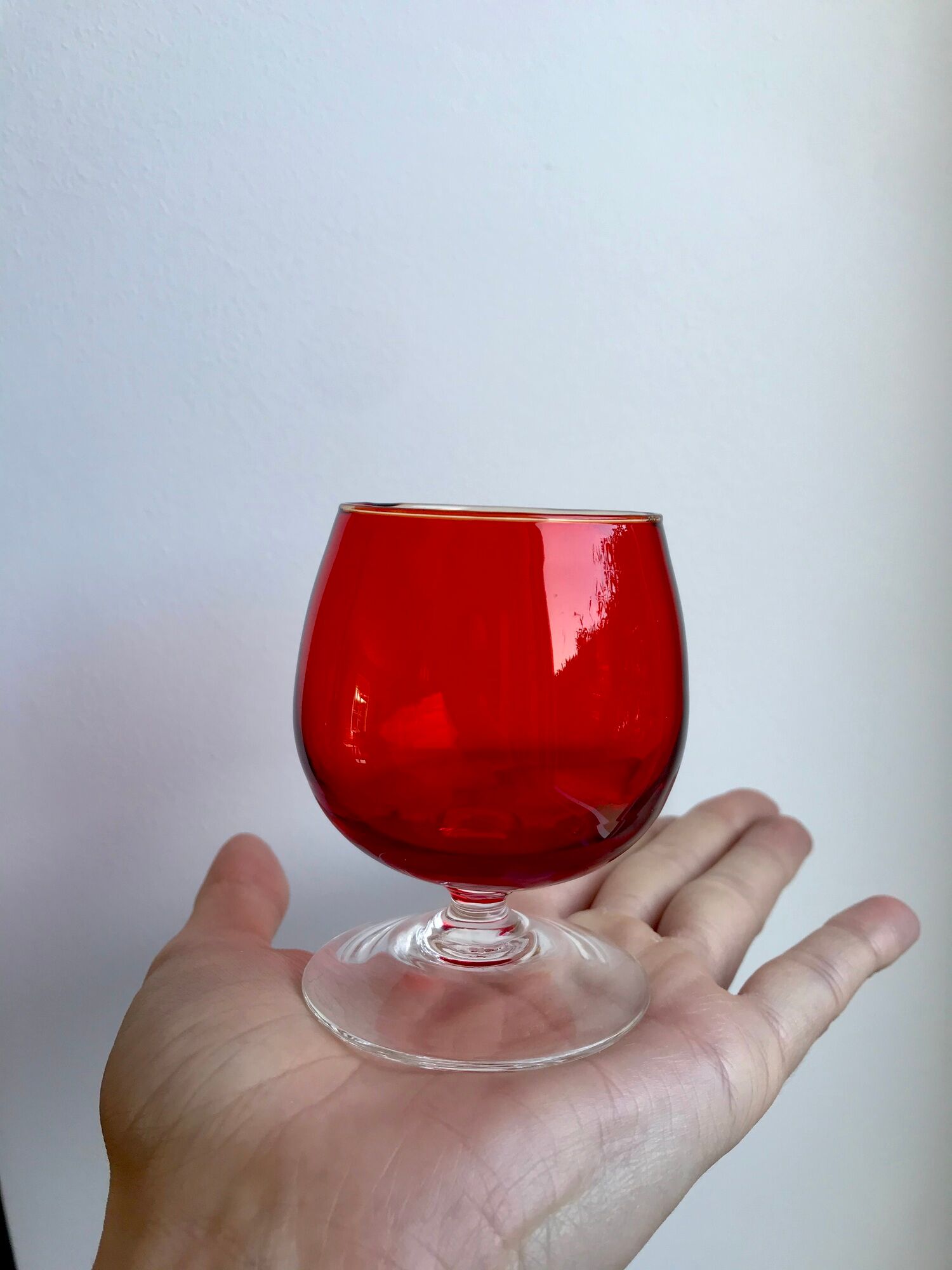 Set of 9 glasses with colored feet in blown glass 50s