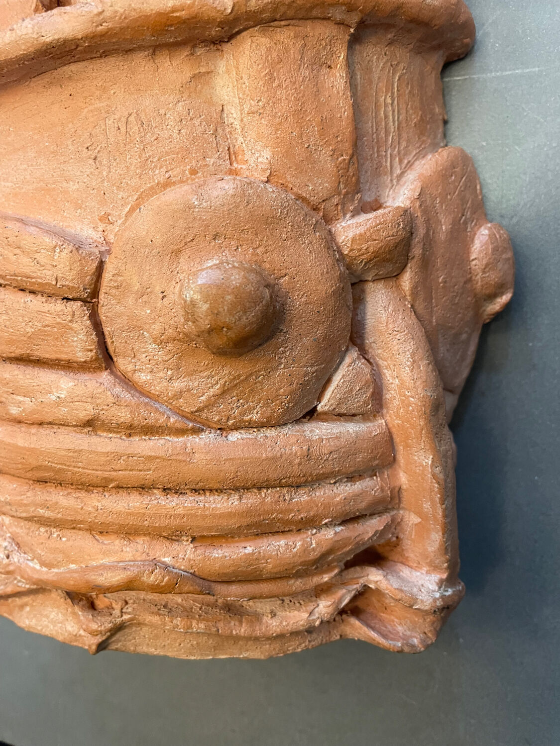 Terracotta sculpture wall light