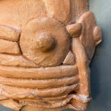 Terracotta sculpture wall light