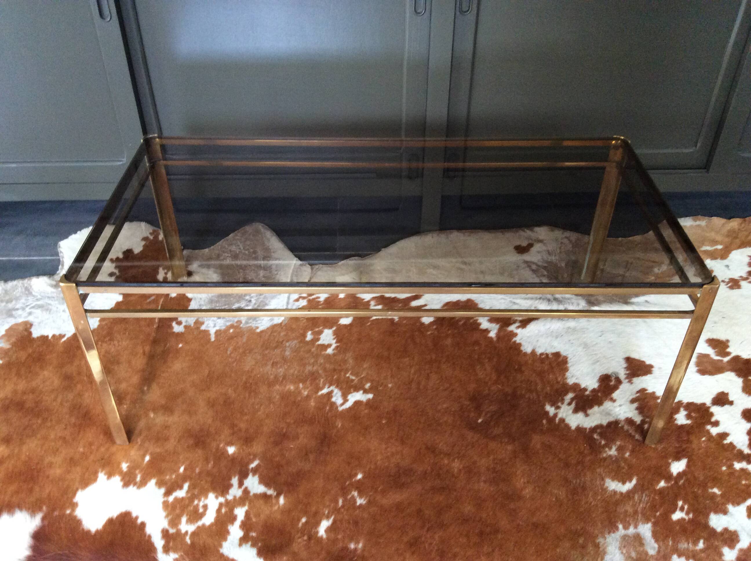Glass and brass coffee table