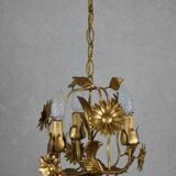 golden chandeliers with flowers.