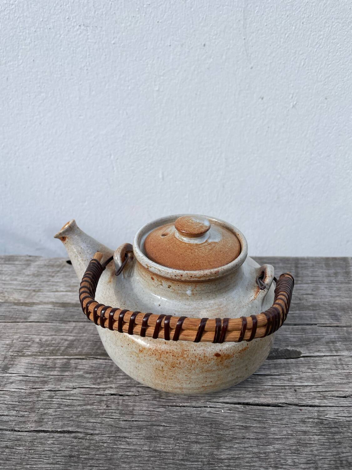 Grand Feu ceramic stoneware and rattan teapot