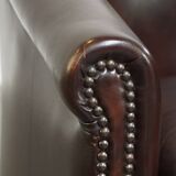 dark cowhide club chair in English style