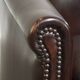 dark cowhide club chair in English style