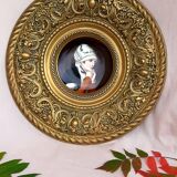 Brass wall decoration repelled hand-painted portrait