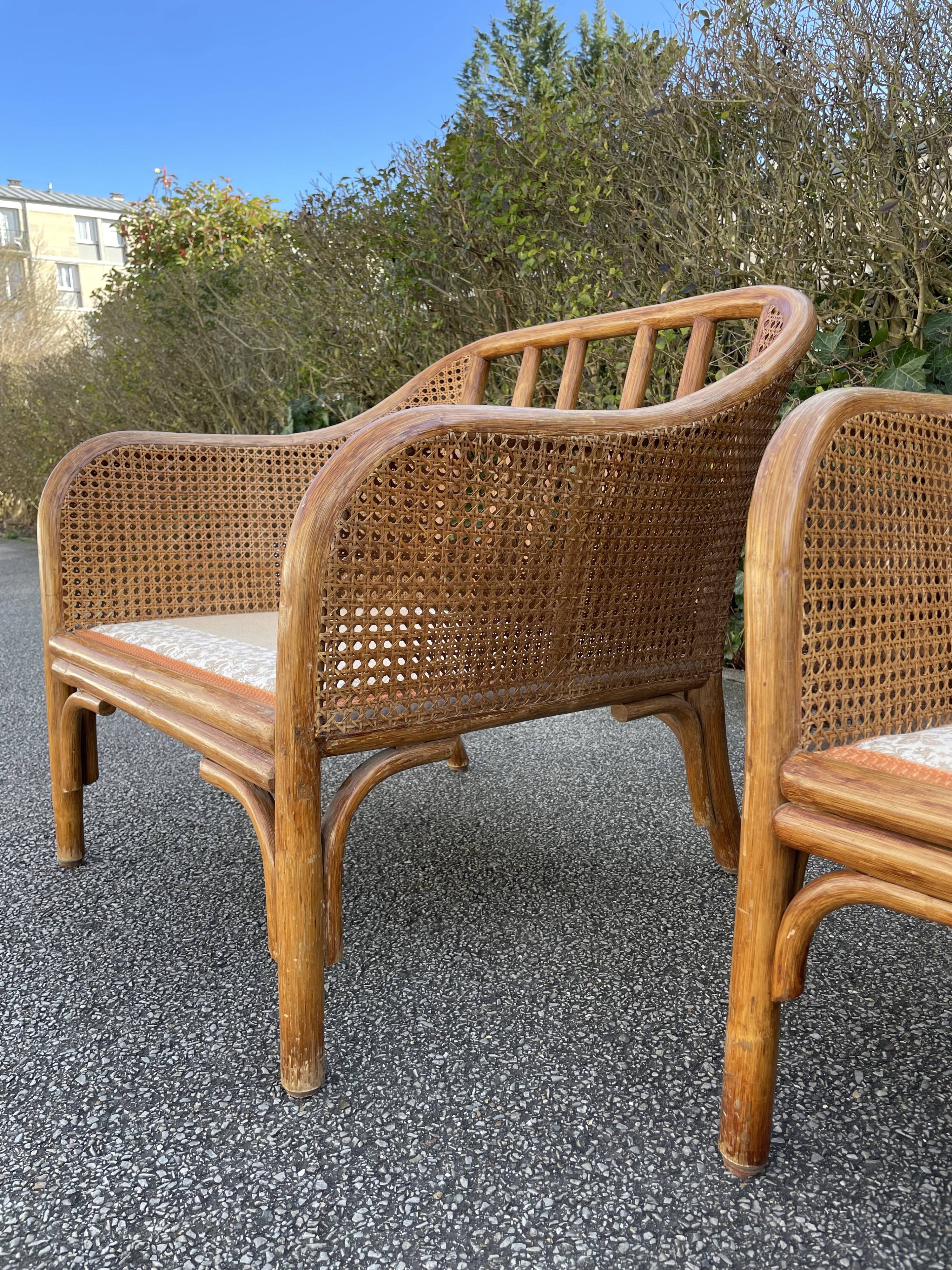 Paire de fauteuils en rotin et cannage