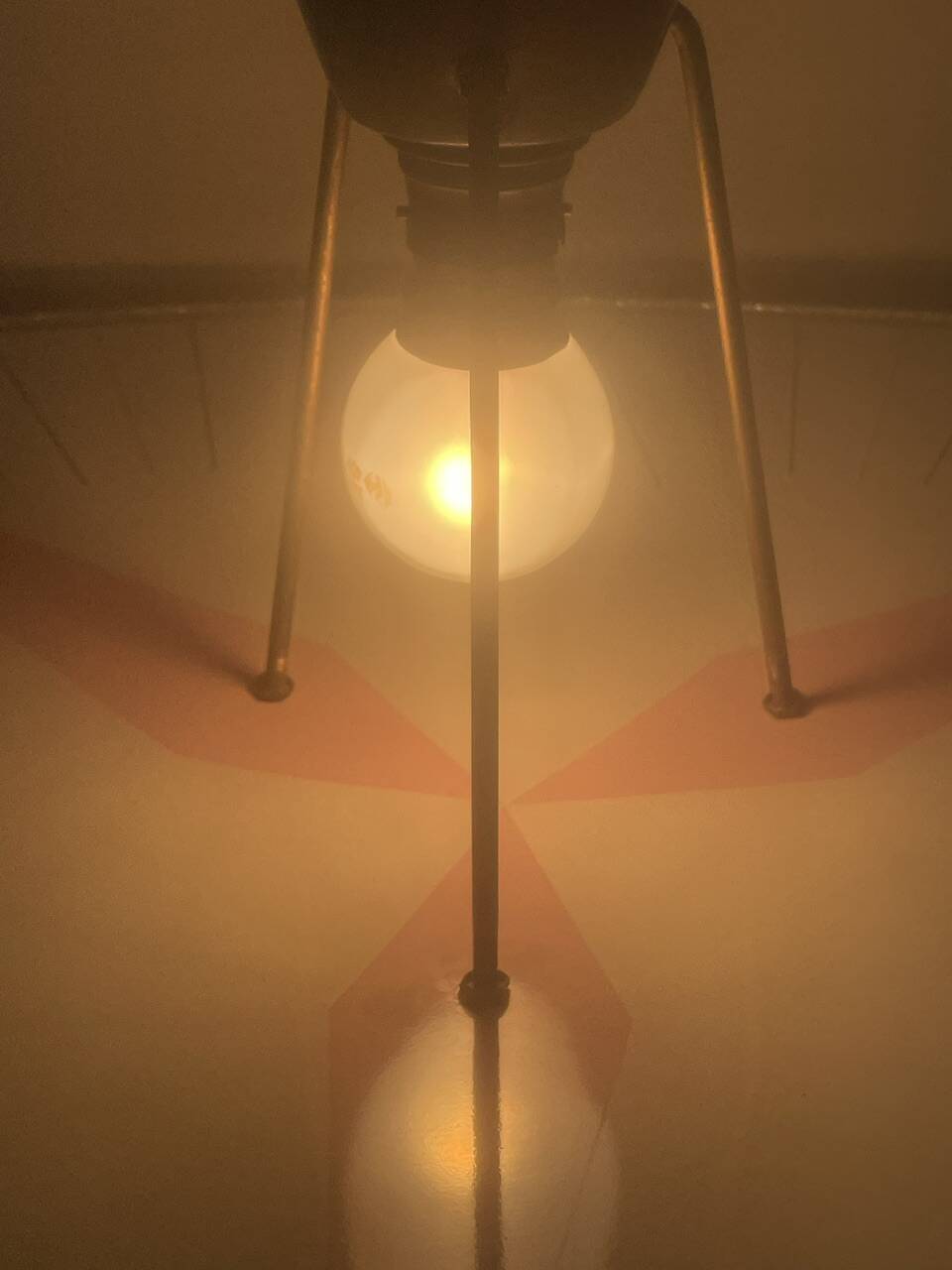 Vintage triangular ceiling light in glass and brass circa 1970s.