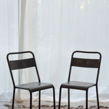 Pair of patinated metal chairs