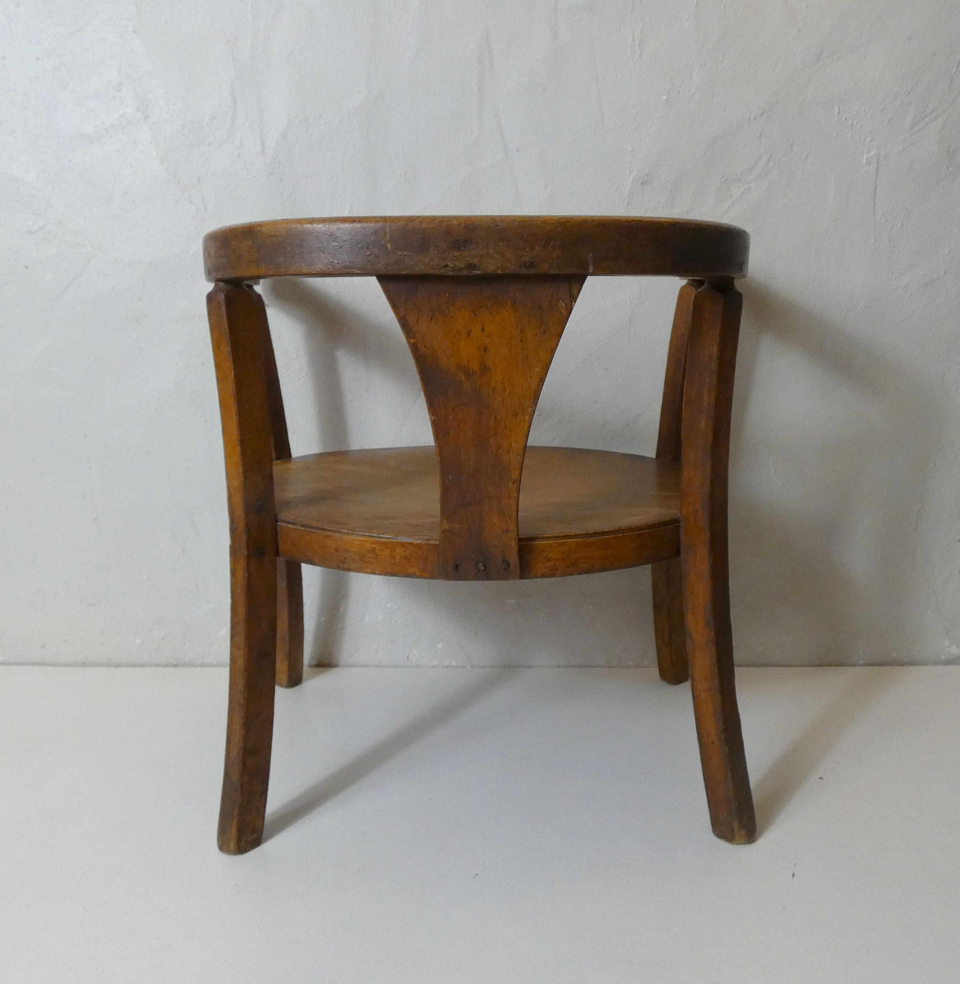 Old wooden armchair for children