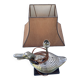 Old vintage lamp representing a duck in silver metal with wooden base