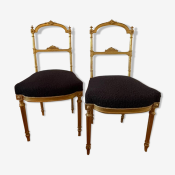 Paire de chaises volantes style Louis XVI