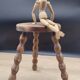 Tabouret tripode pieds boules