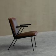 Modernist Dutch lounge chair in enamelled steel and leather from the 1950s.