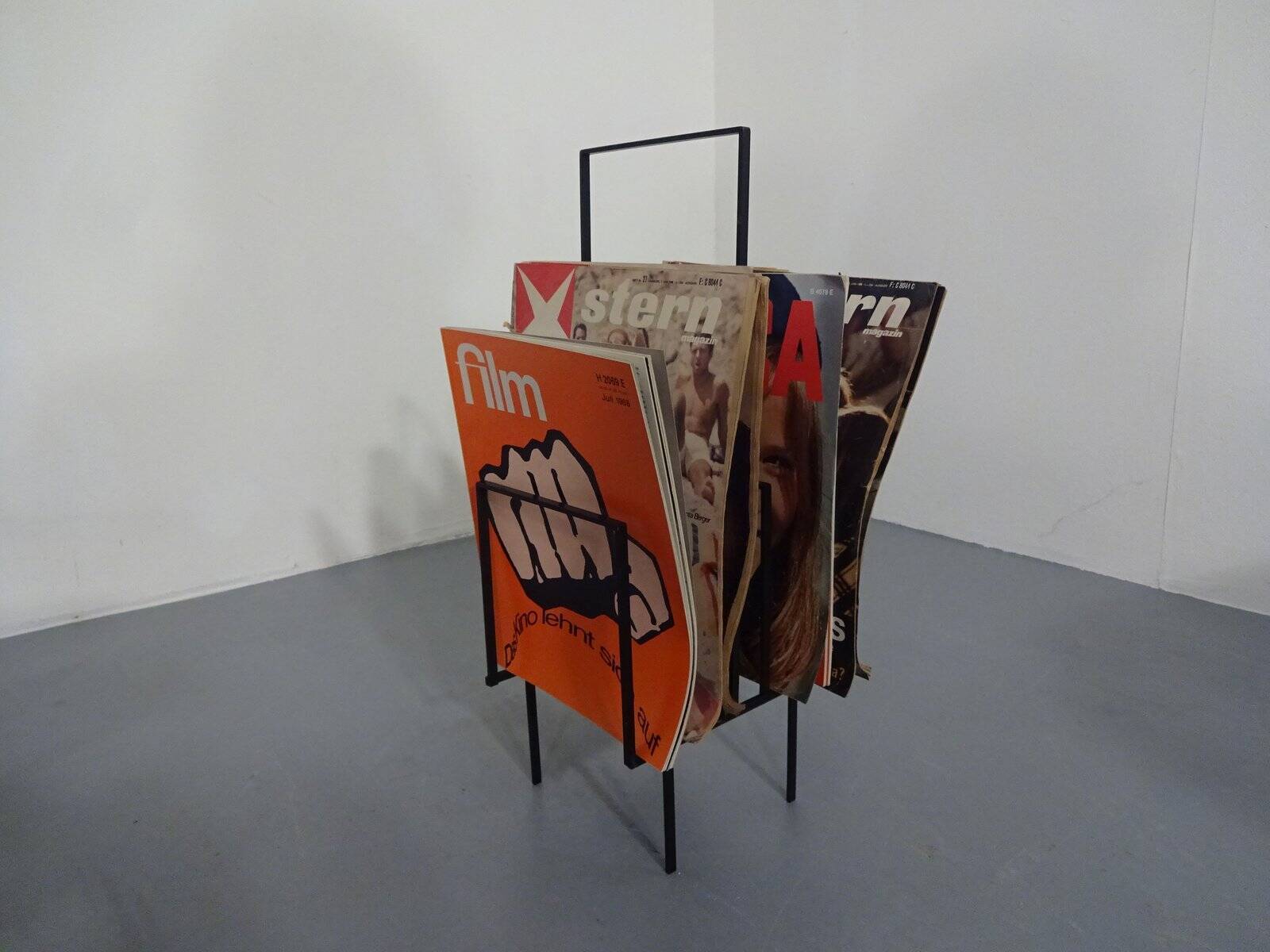 Steel magazine or record racks, 1960s, set of 2