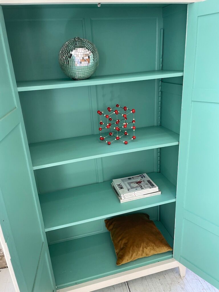 White and green cutter cabinet