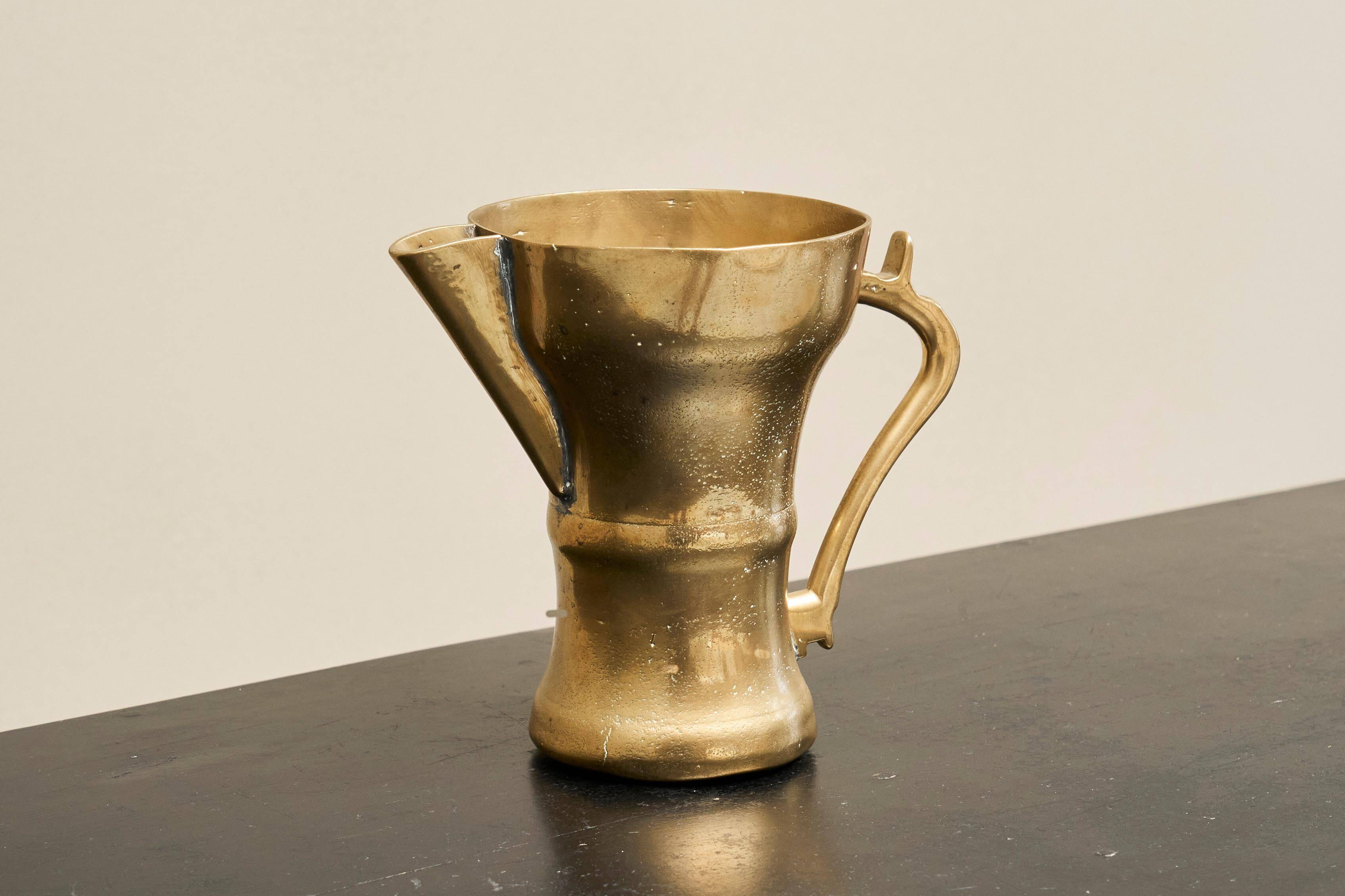 Antique brass jug, 19th century.