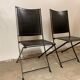 1950s vintage iron folding chairs and leather