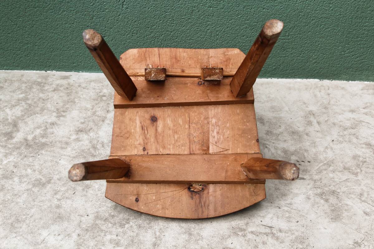 Old Swiss escabelle chair in carved wood