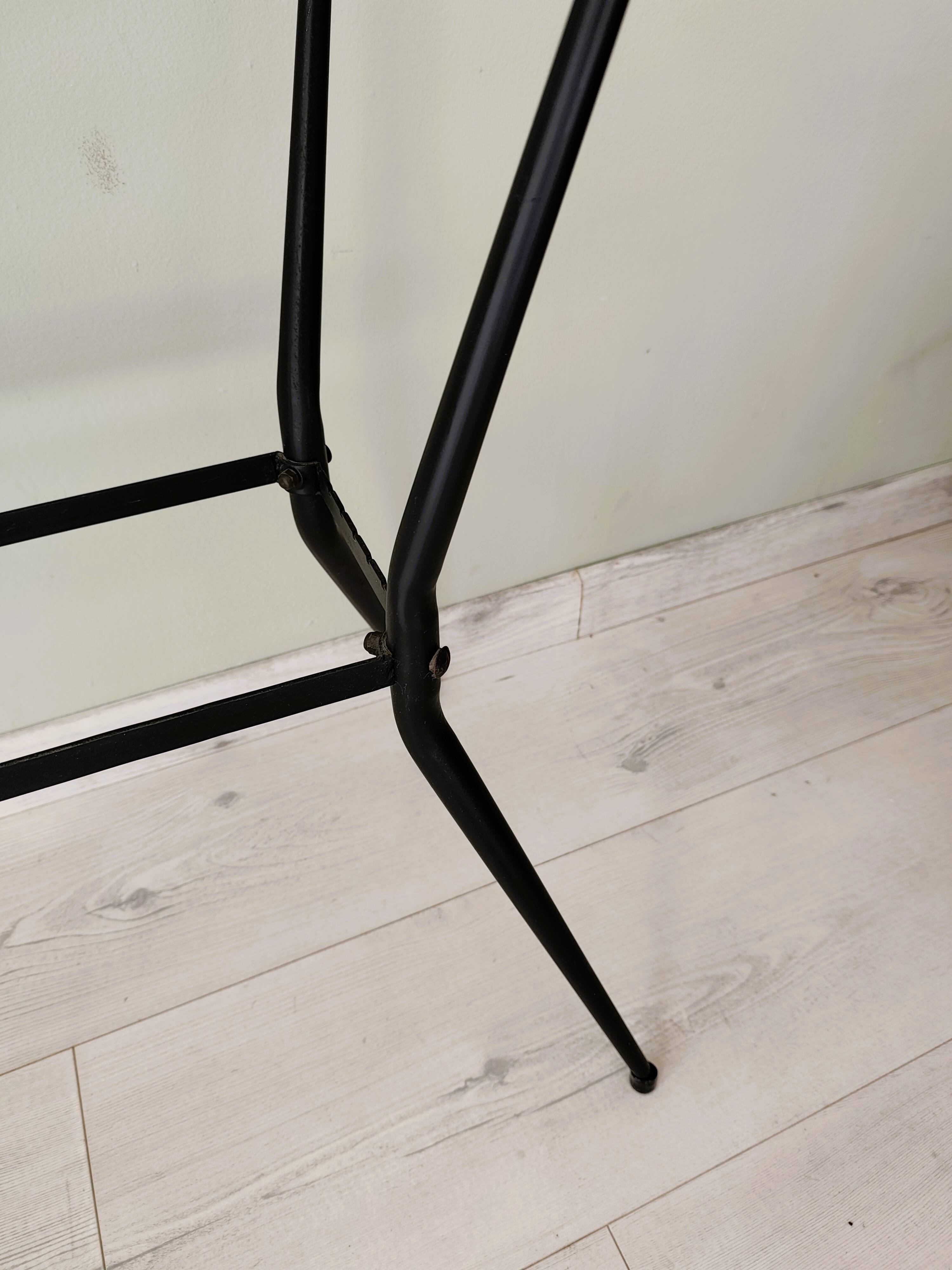 Antique side table made of metal and glass