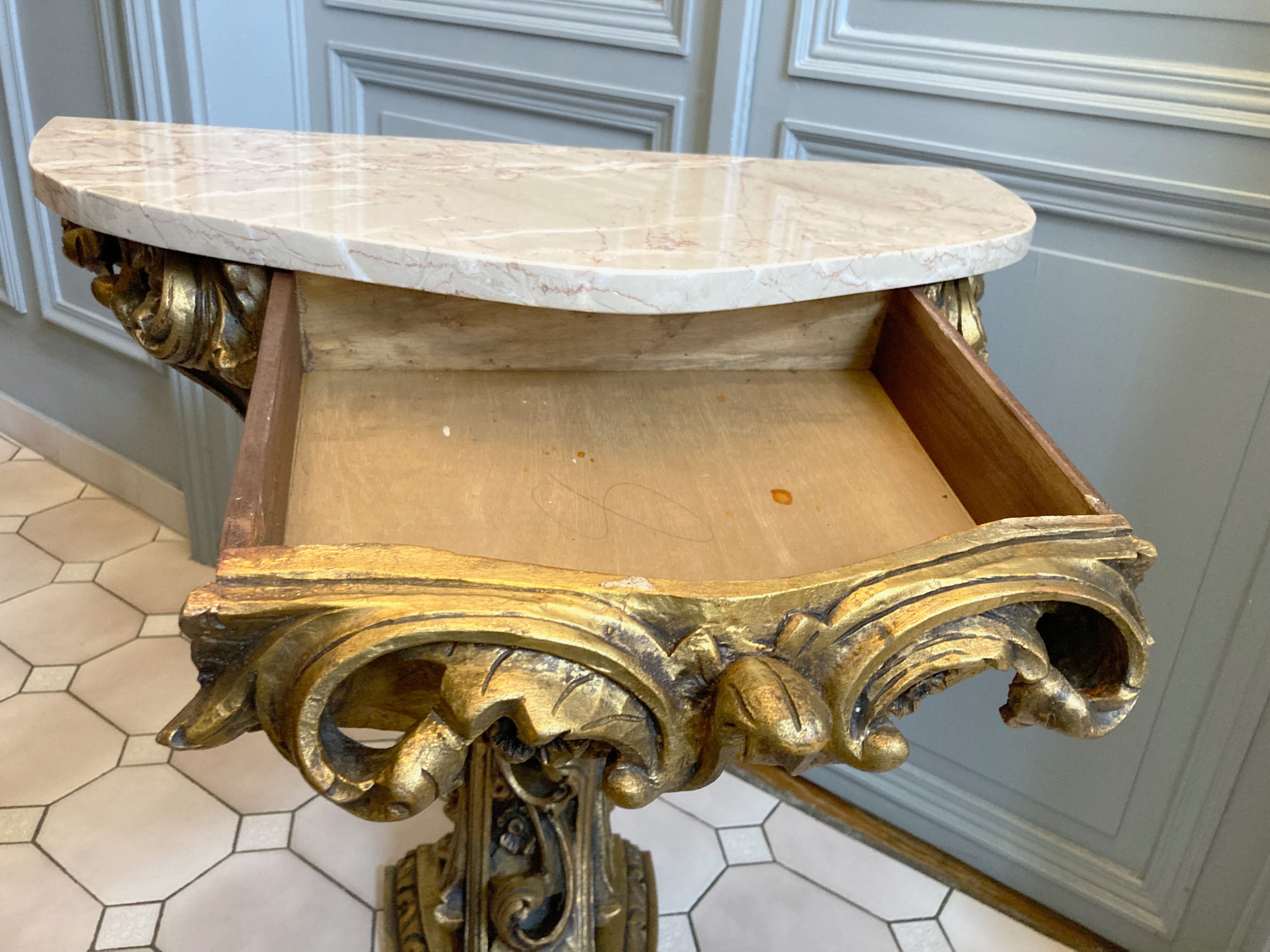 Carved wooden and marble console