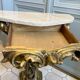 Carved wooden and marble console