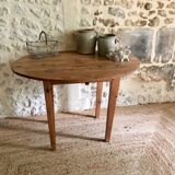 Antique round wooden table