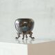 Neoclassical cup with a patinated and silvered copper base.