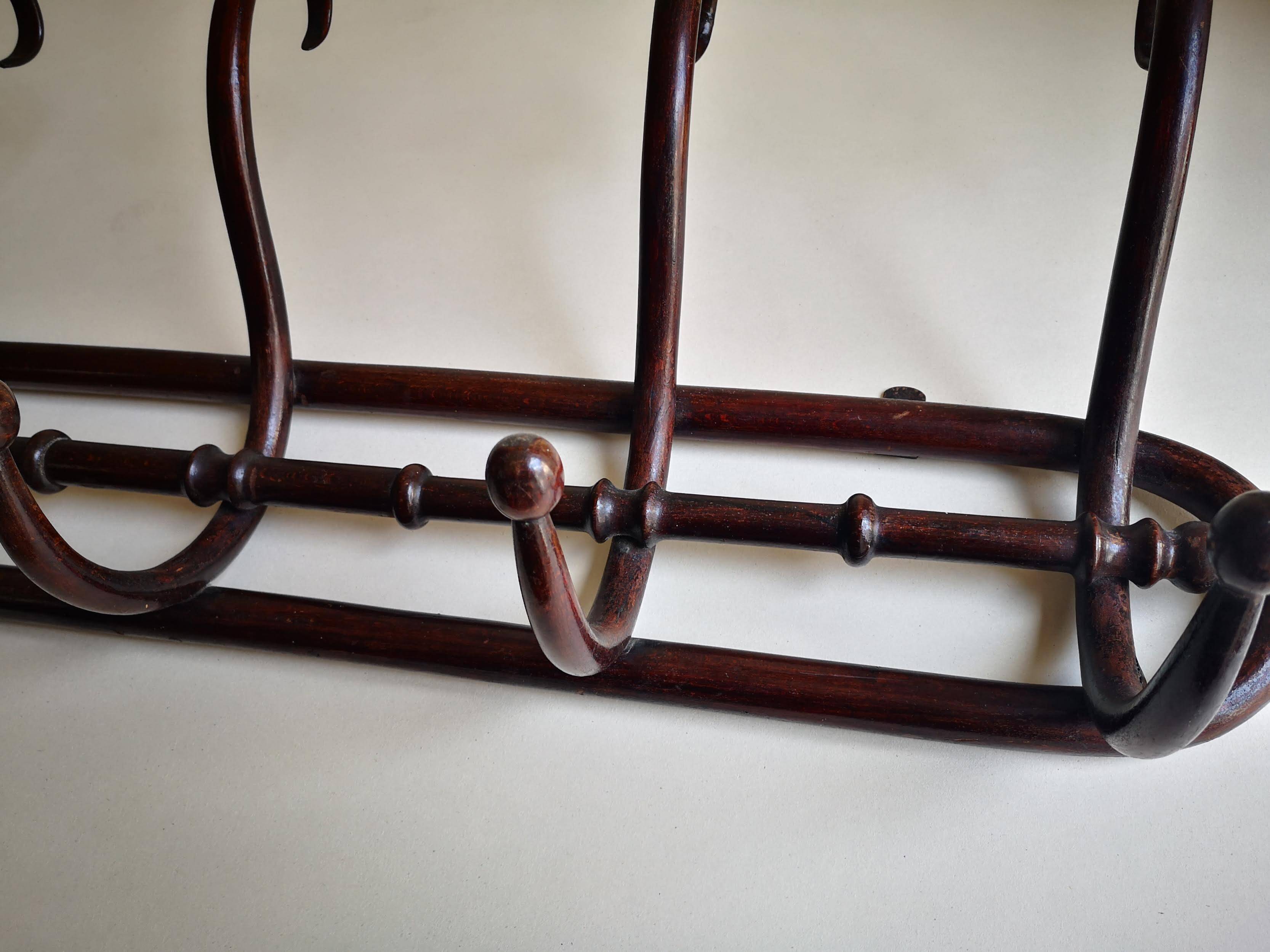 Vintage wooden wall coat rack