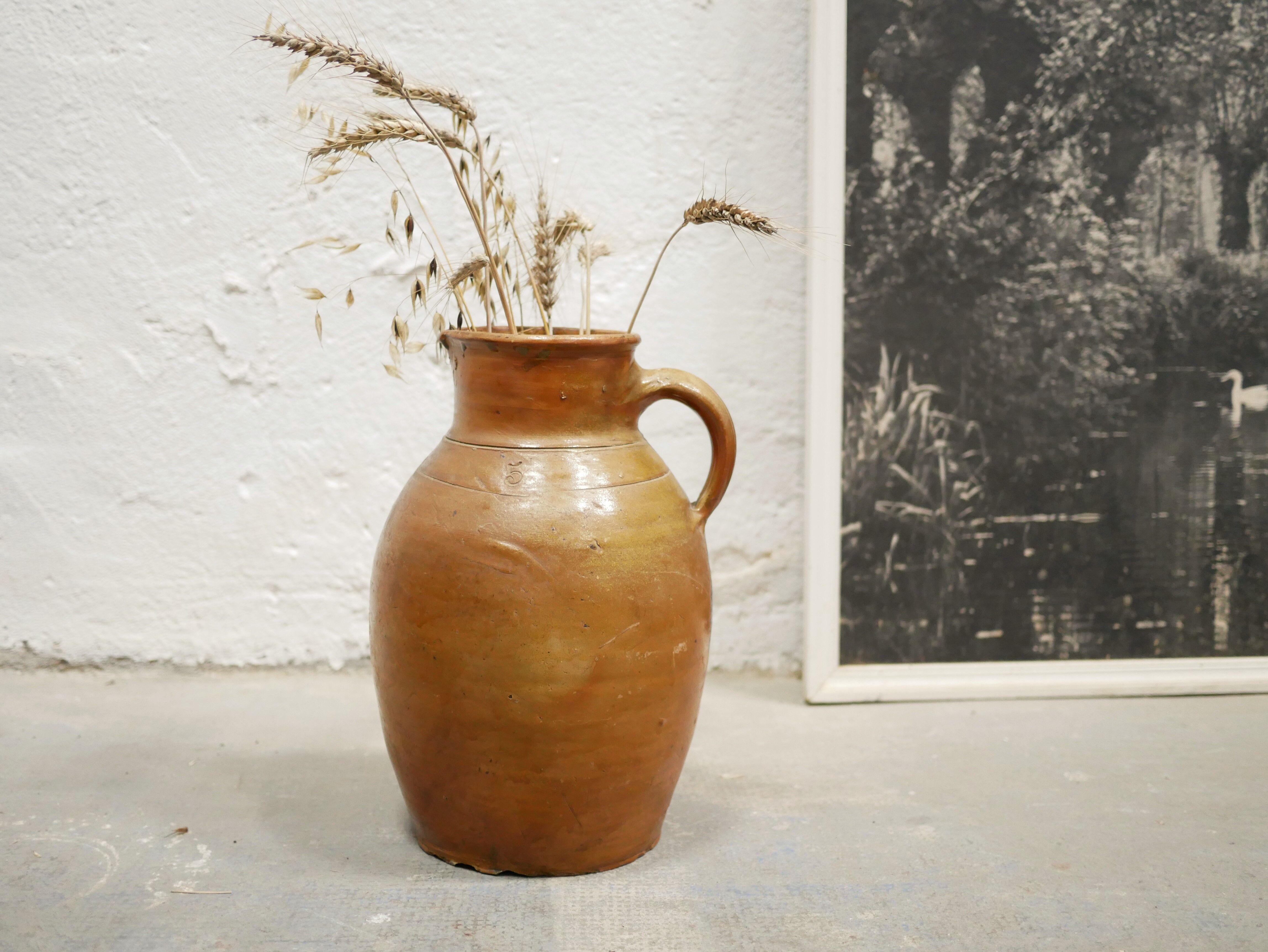 Pot à lait vintage en terre cuite vernissée