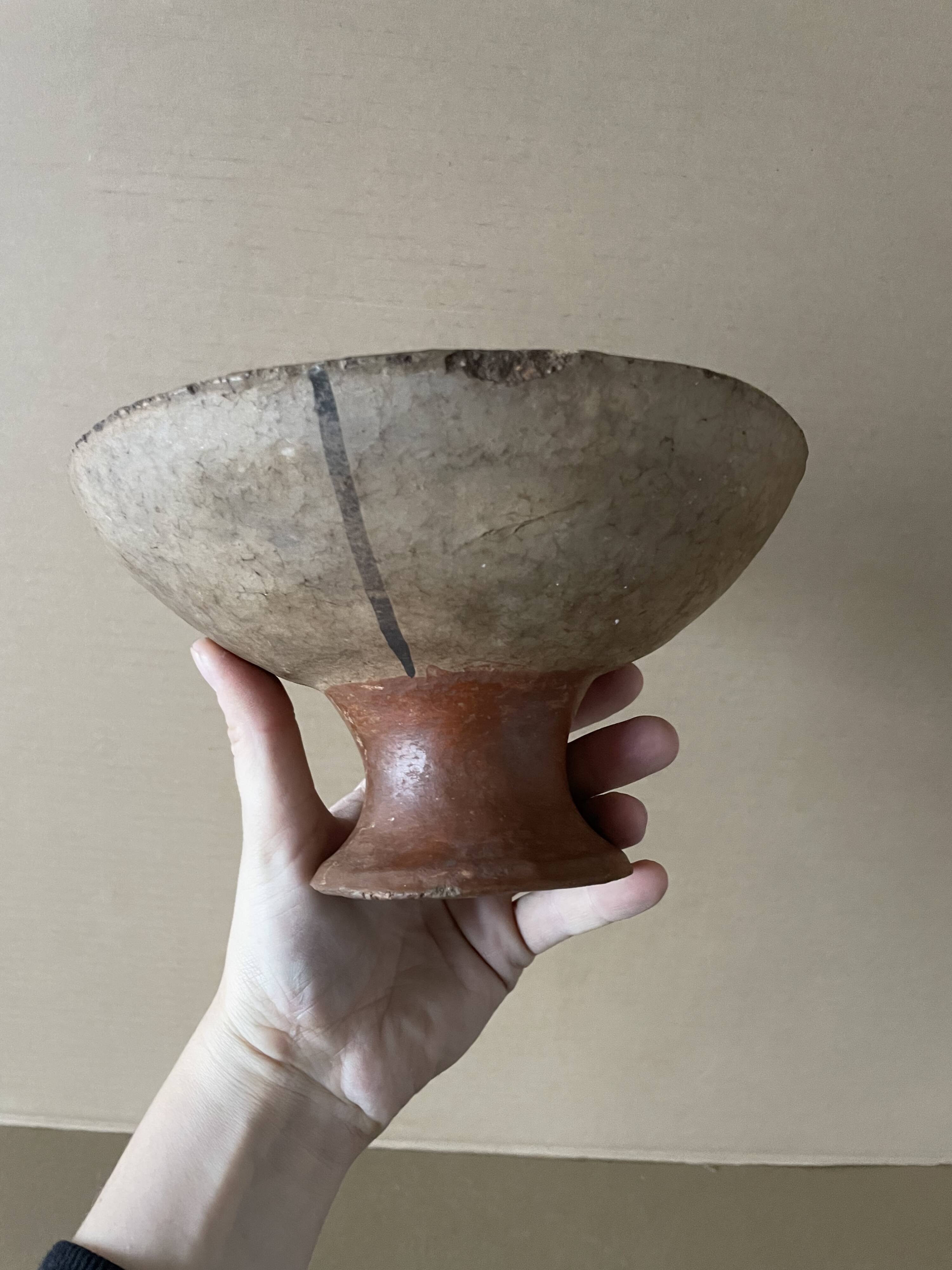 Antique terracotta cup