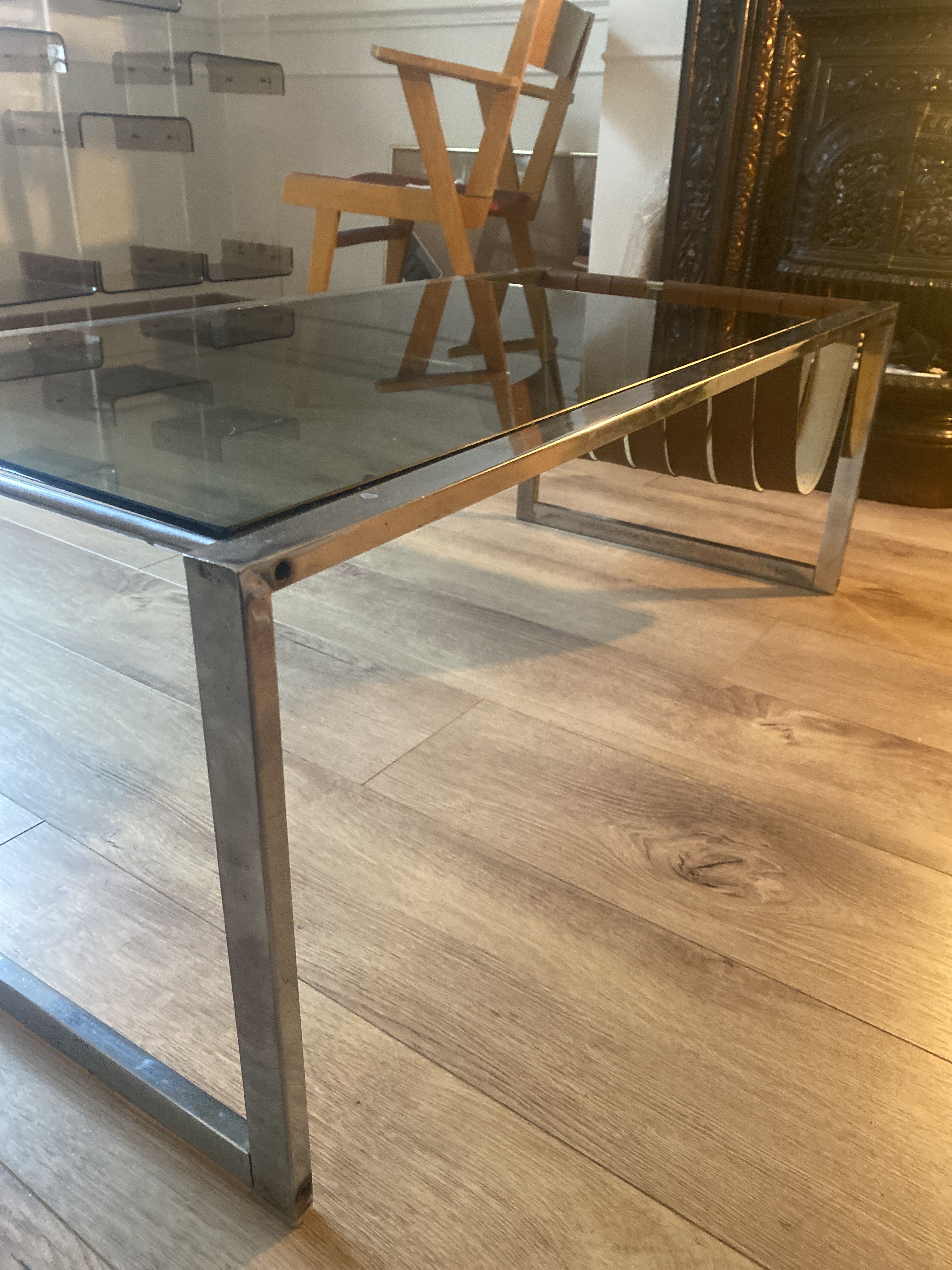 Stainless steel and glass coffee table with revised door with leatherette straps design 1970