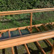 Table basse vintage en rotin et verre