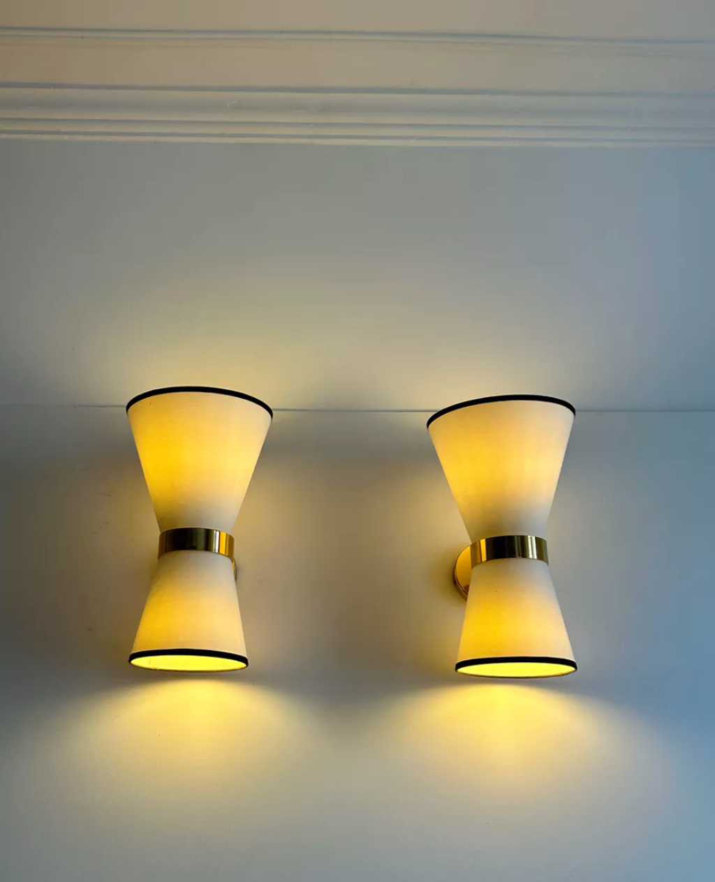Pair of vintage wall lamps, solid brass and unbleached fabric, Italy 1980