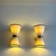 Pair of vintage wall lamps, solid brass and unbleached fabric, Italy 1980
