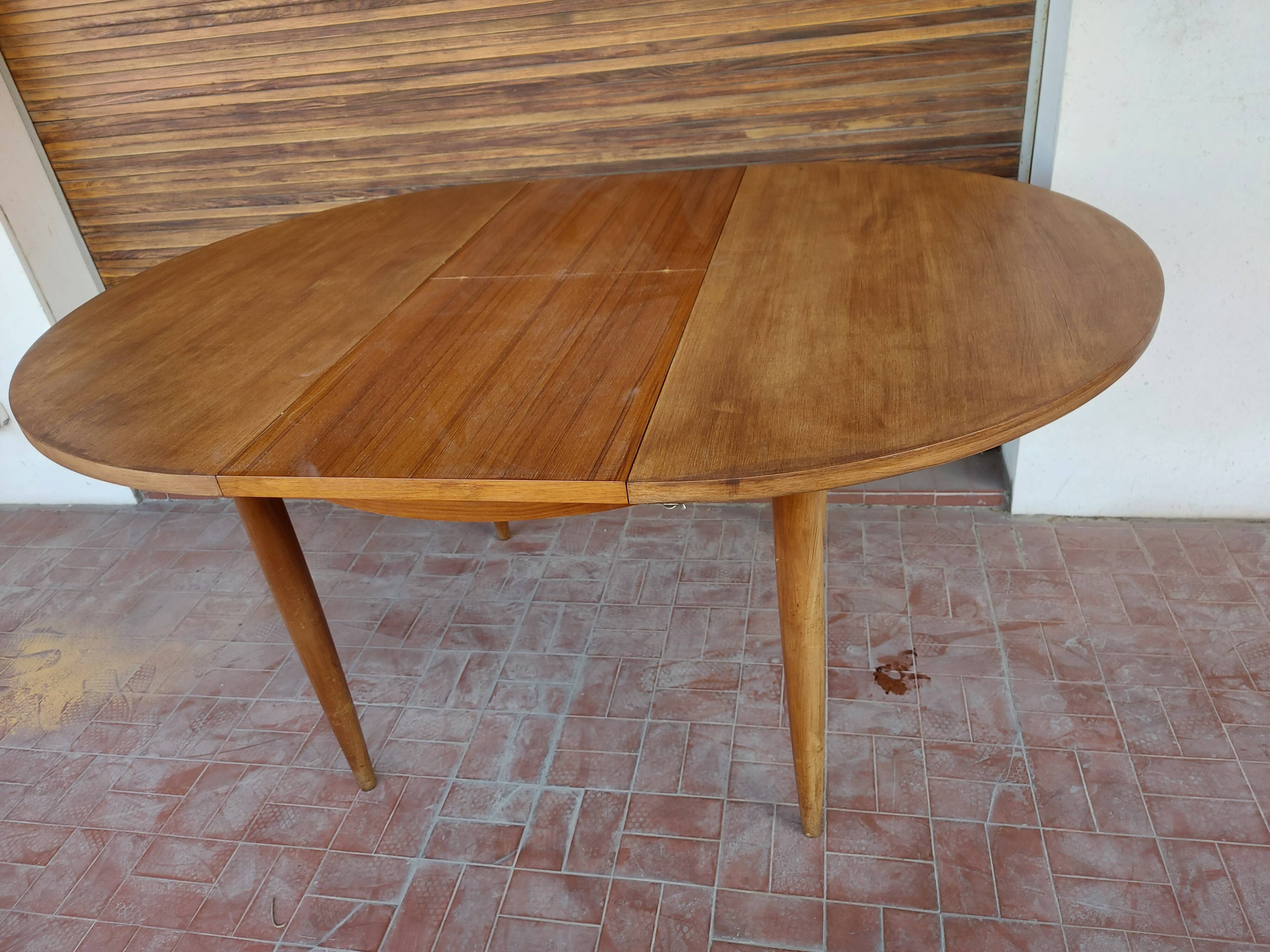 Scandinavian design teak table with extension cord