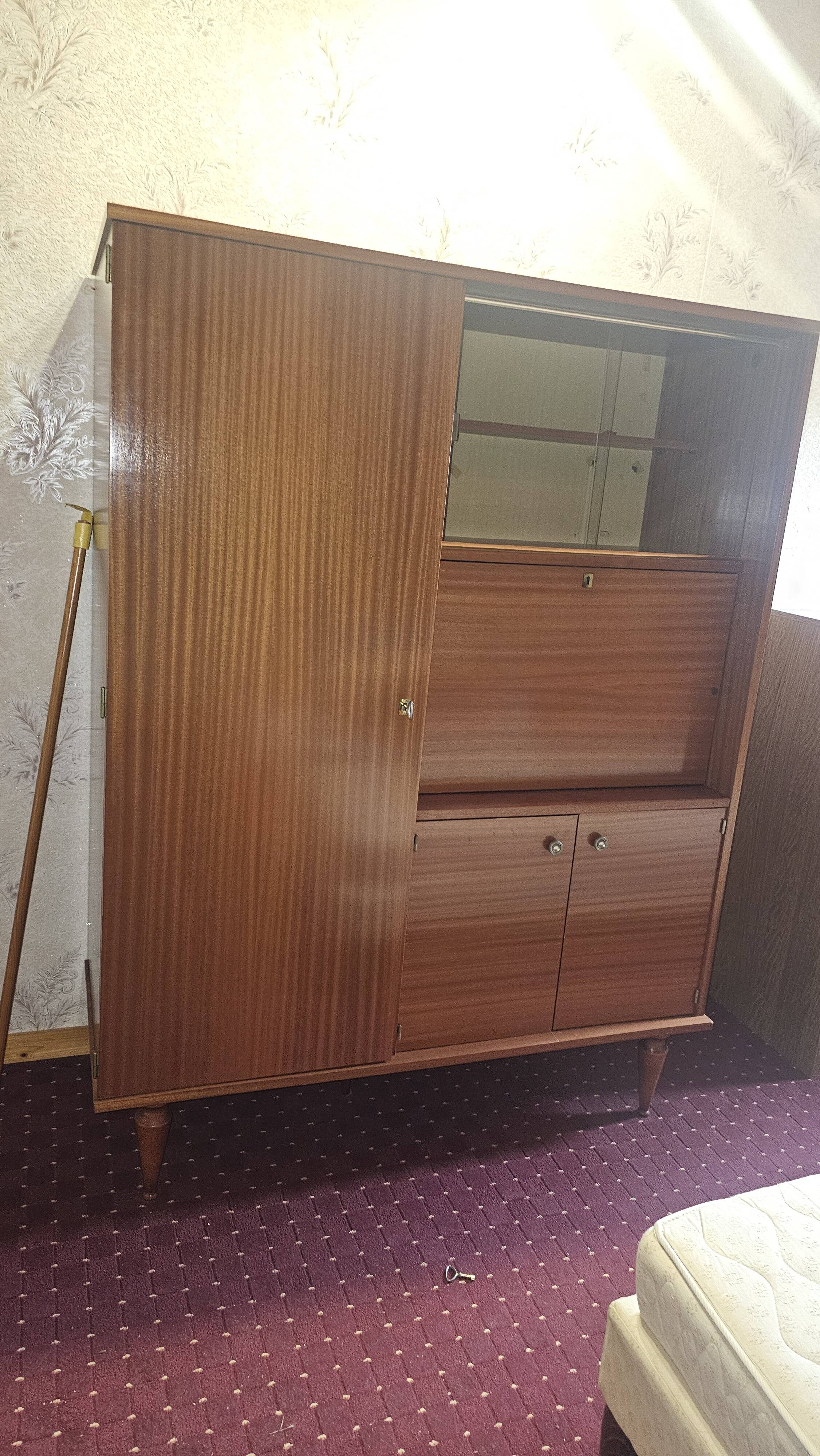1960s teak veneer secretary with sliding display cabinet.