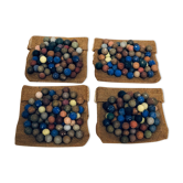70 clay marbles and burlap bag
