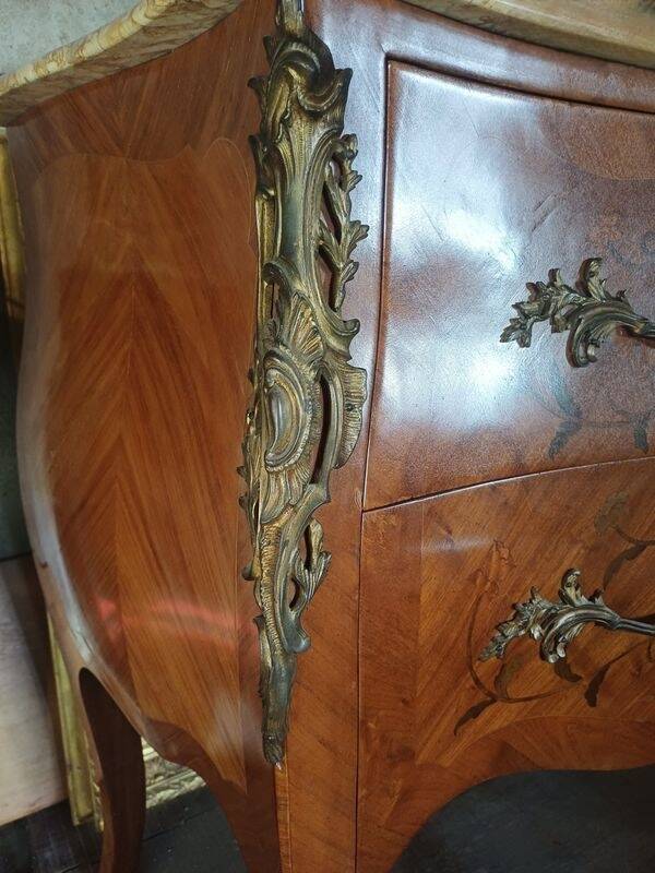 Louis XV style commode with marquetry and marble.