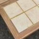 Extendable kitchen table renovated in raw solid wood and ceramic tiles