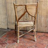 Asymmetrical rattan armchair