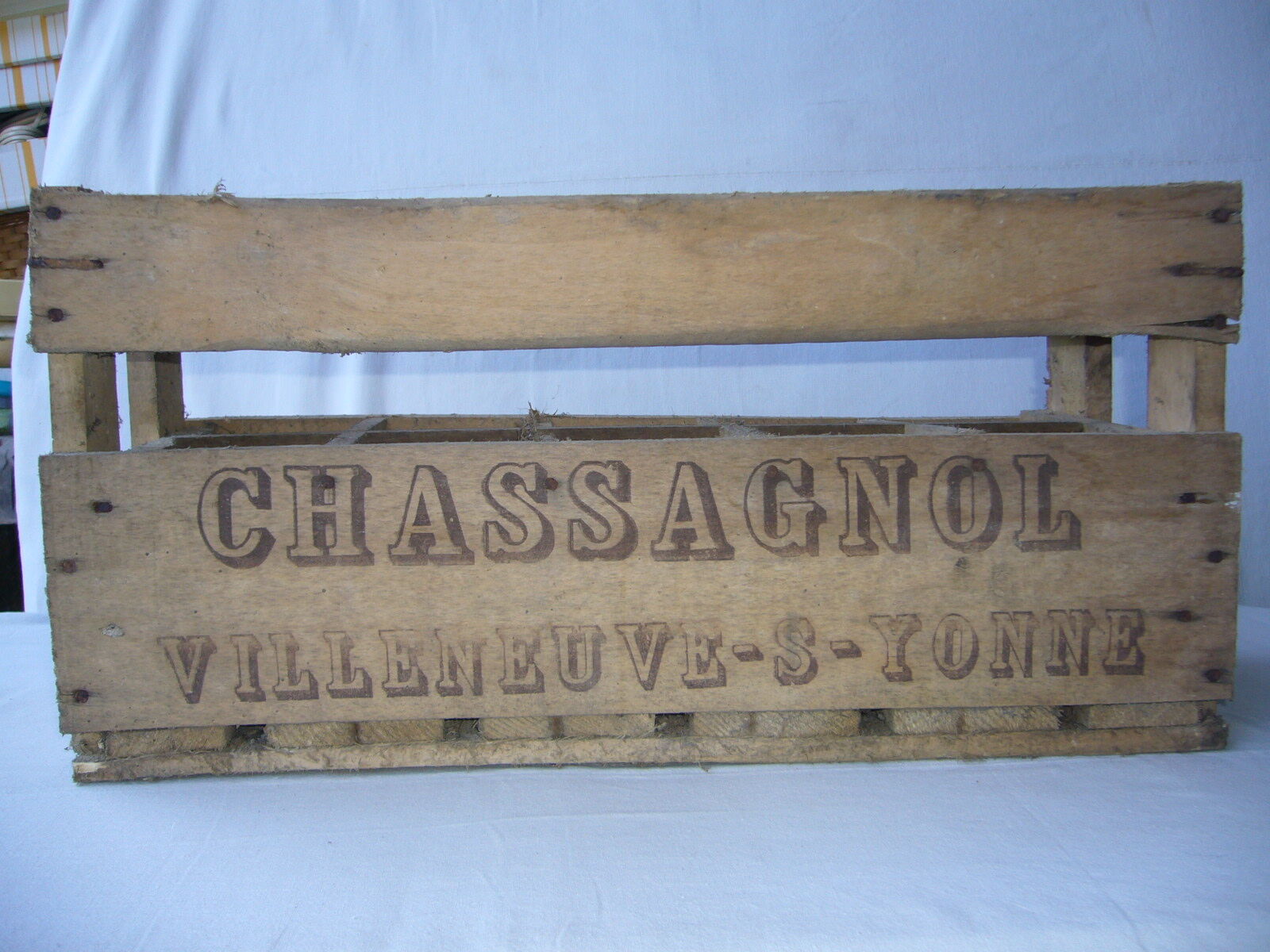 Old wooden crate for milk bottles