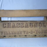 Old wooden crate for milk bottles