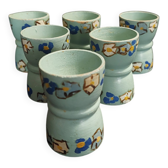 Antique painted wooden egg cups, set of six from the 1930s.