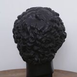 Greek head in waxed black plaster