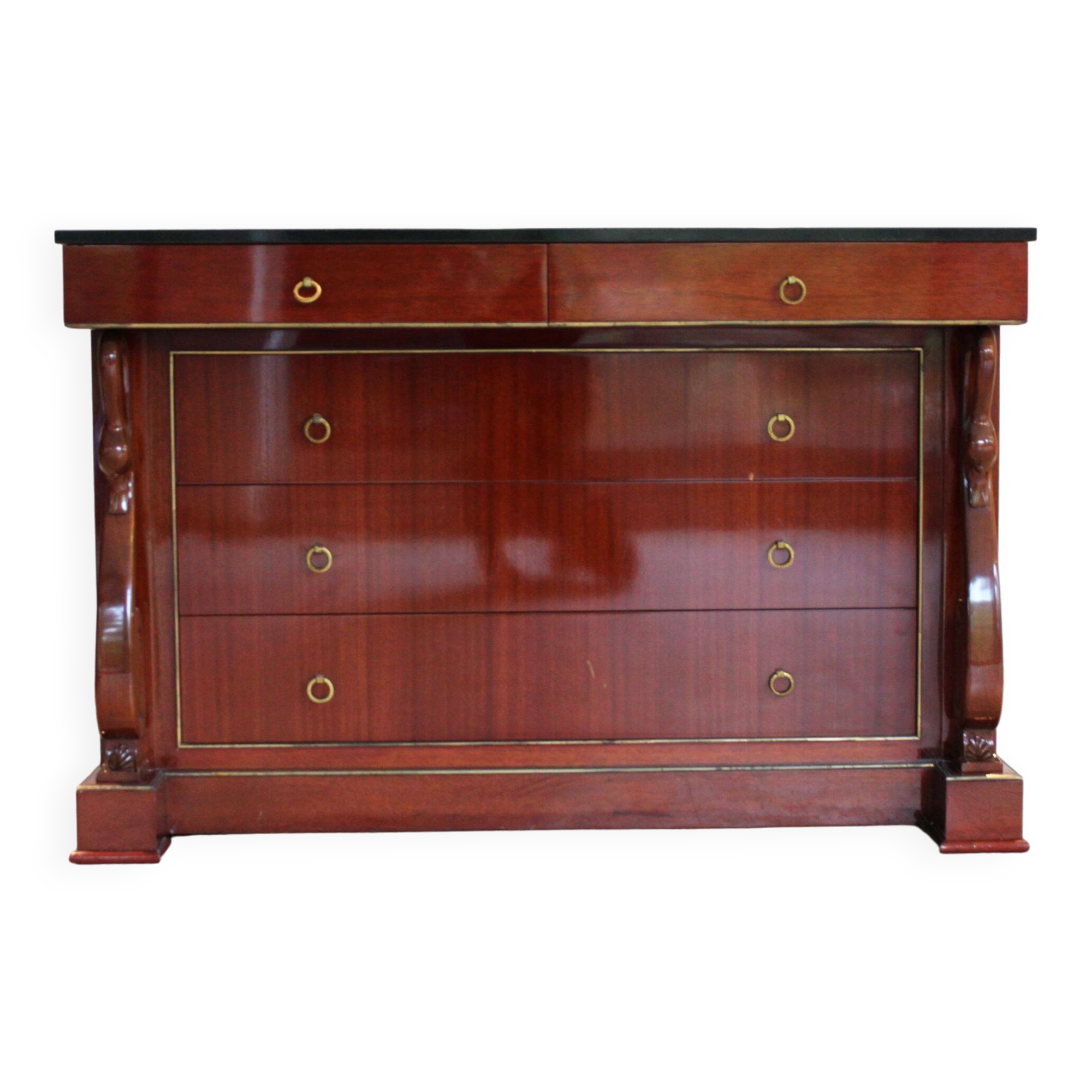 Mahogany “swan neck” chest of drawers, Empire style, 19th century.