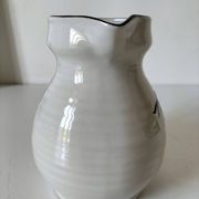 Ceramic pitcher from Quimper, created by Dominique Villard.
