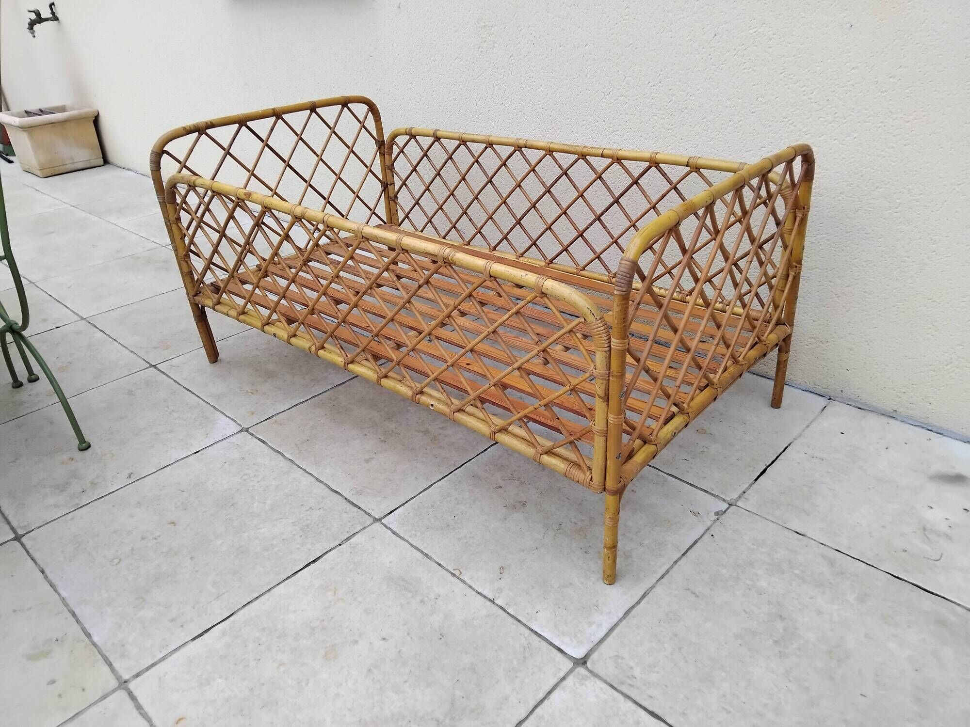 Vintage rattan child or baby bed