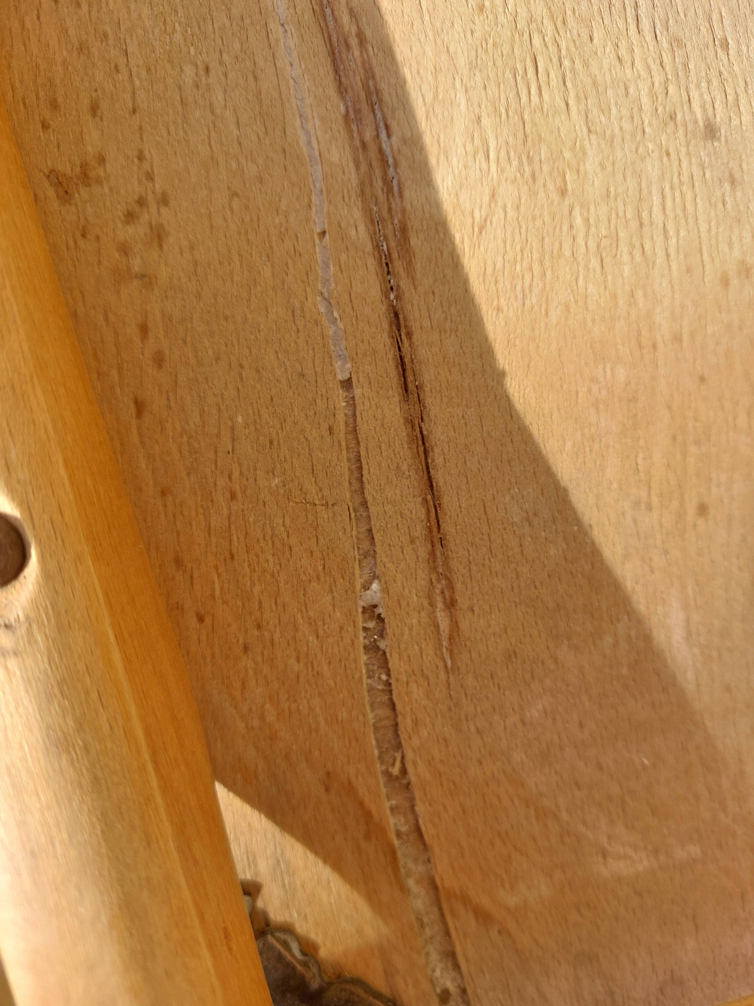 3 Scandinavian-style chairs, light wood and black faux leather