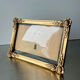 Cadre en bois doré mesures 20 cm x 14 cm verre convexe